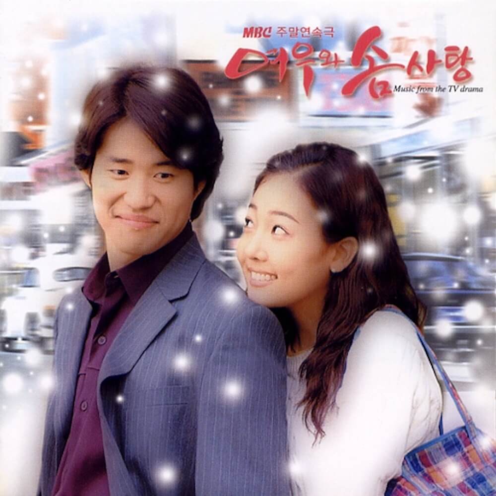 キツネと綿菓子の画像